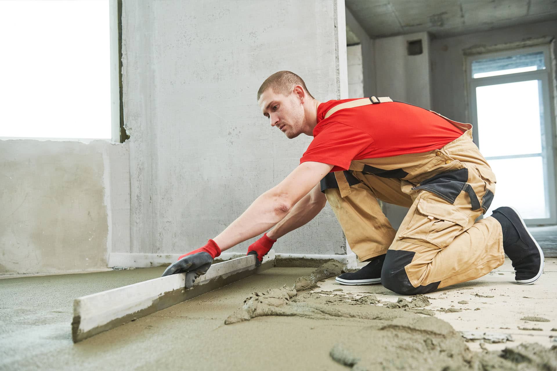 cement-man-screeding-base-layer-flooring-building-materials